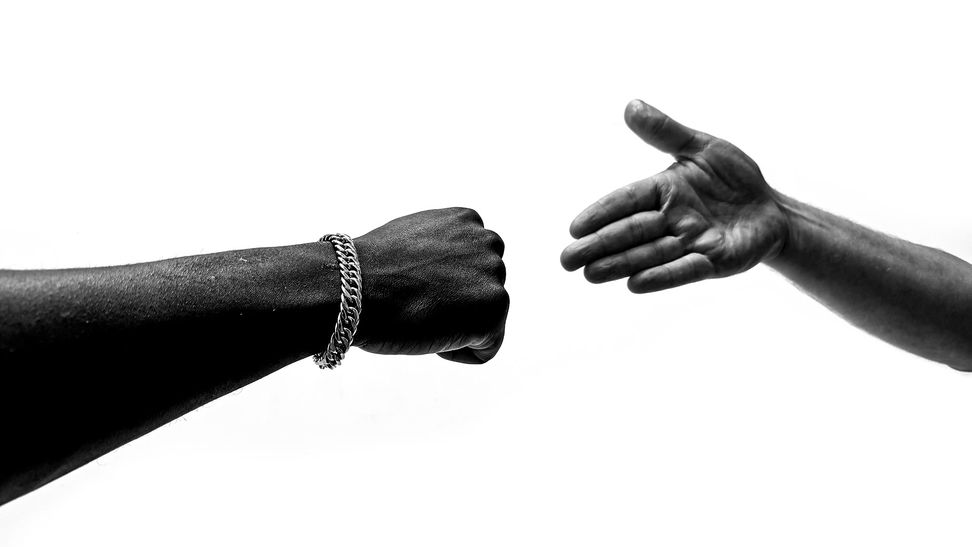 Kojo and Harry, fist meets handshake